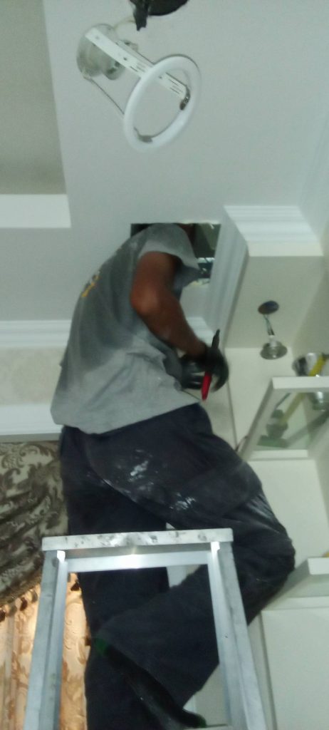 เจาะฝ้าเช็กสายไฟ