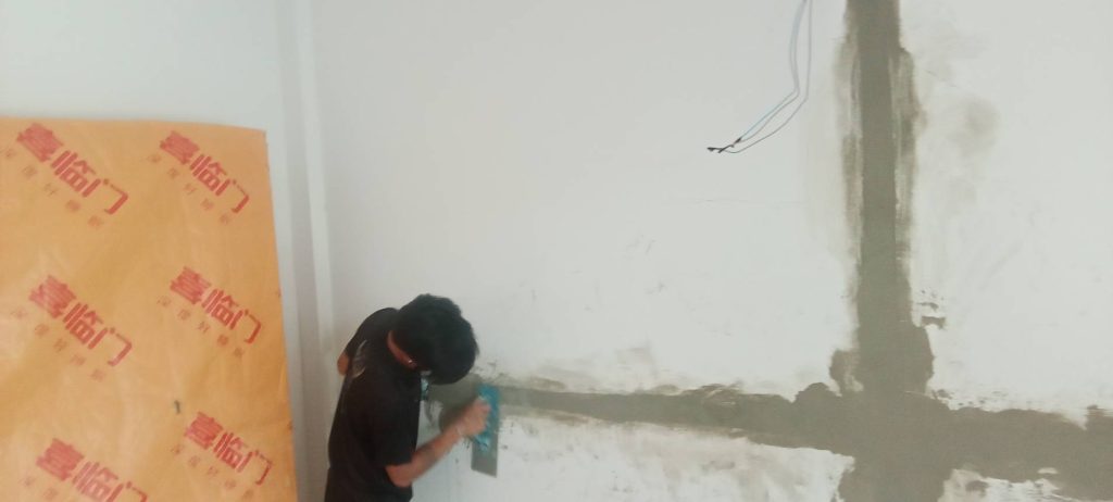 กรีดผนังฝังสายไฟ