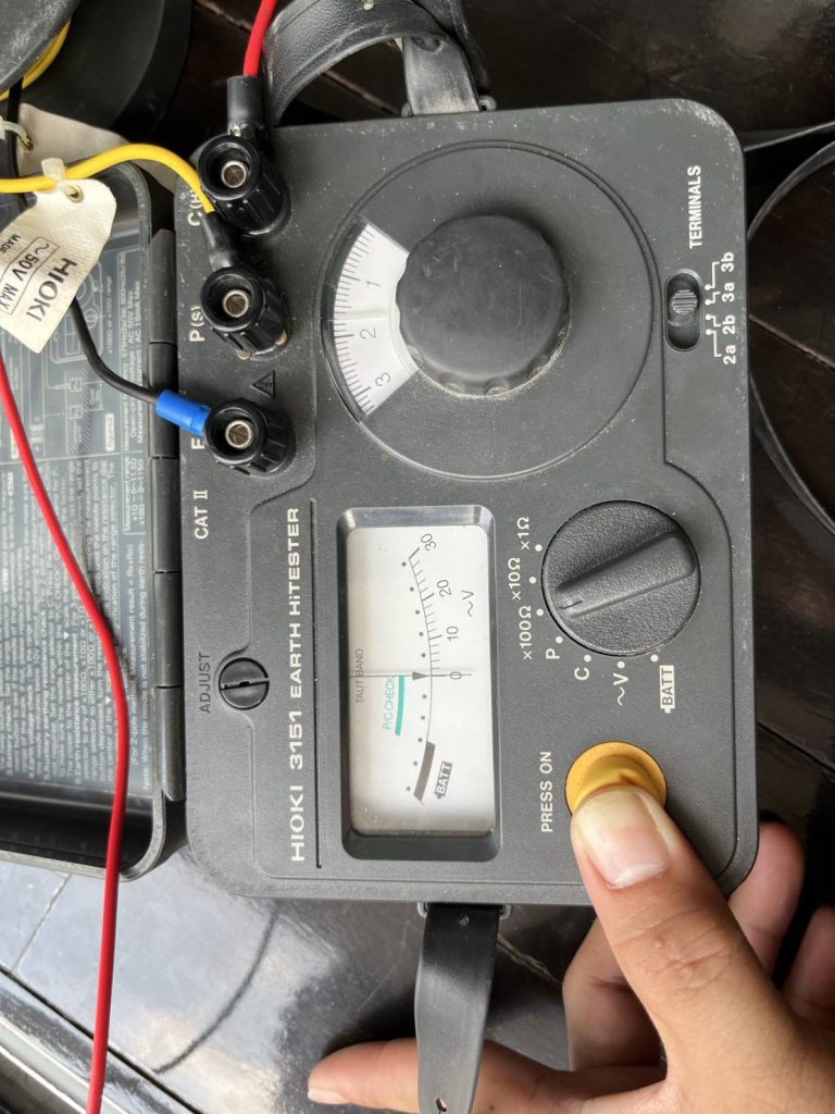 A Hioki 3151 Earth Tester being used to measure ground resistance.