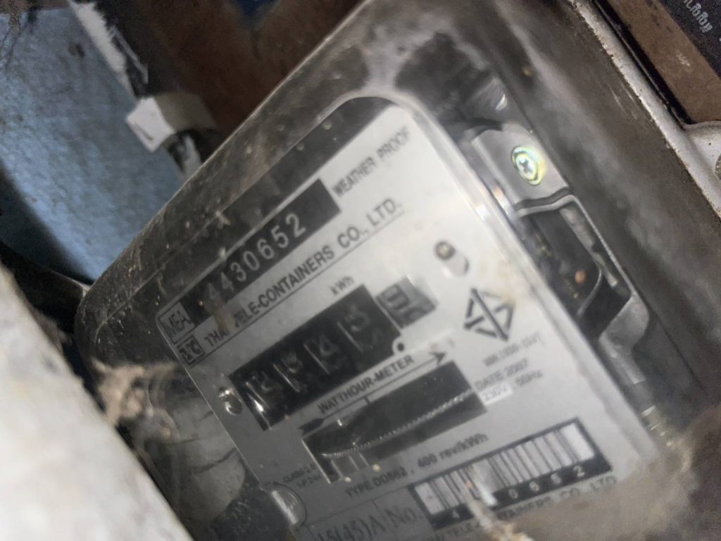 A close-up of an electricity meter showing power usage readings.