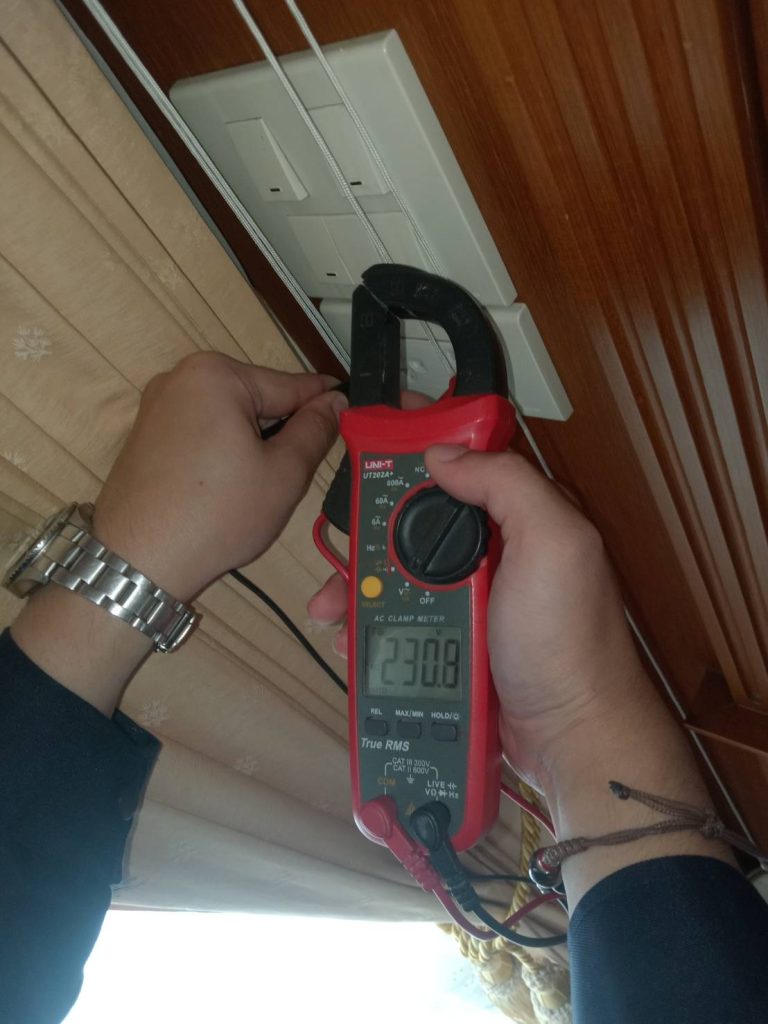 Using a clamp meter to test voltage